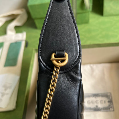 Bolsa Mini Couro Matelassê Letras Entrelaçadas Preto