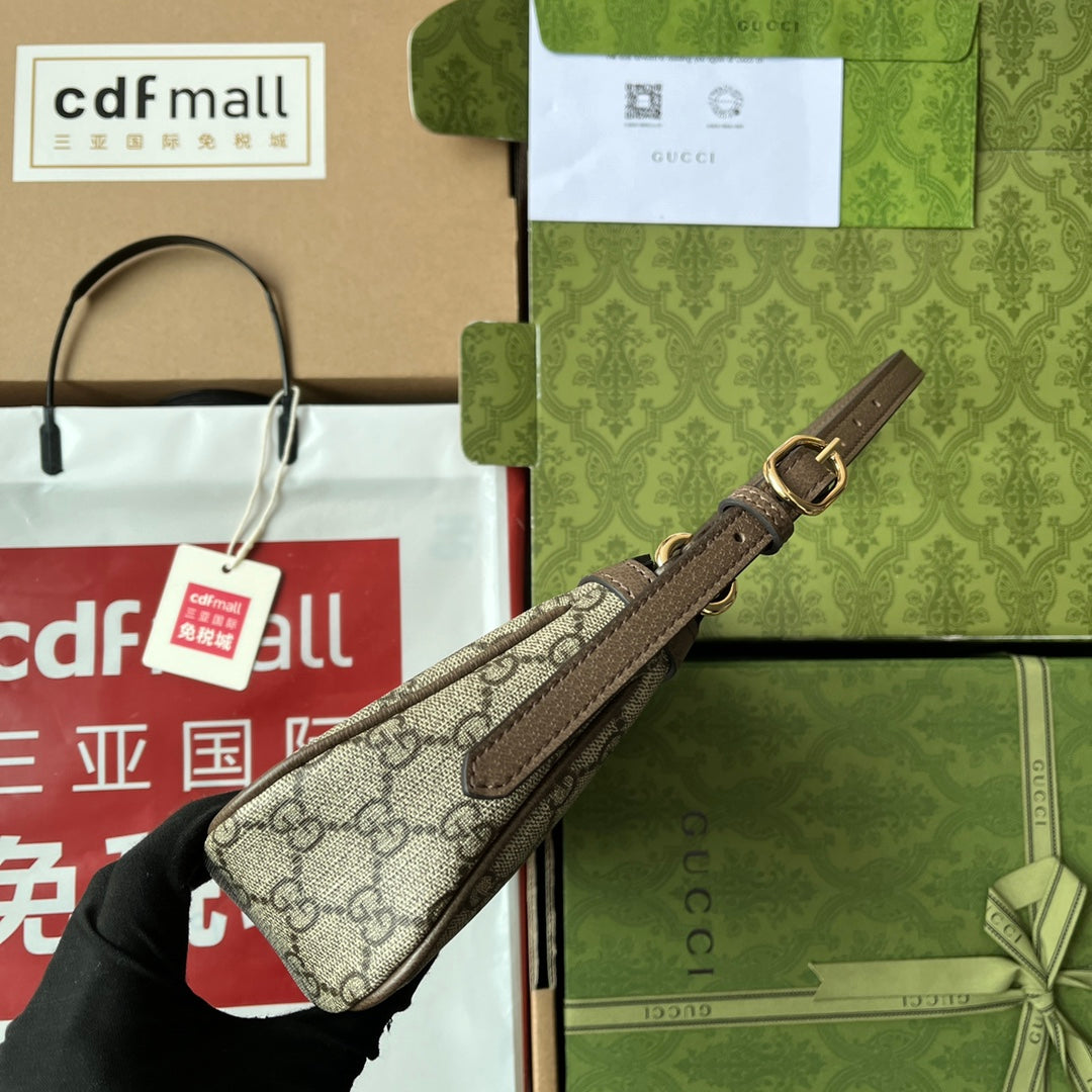 Bolsa Pequena Couro Bege e Preto Alça Corrente