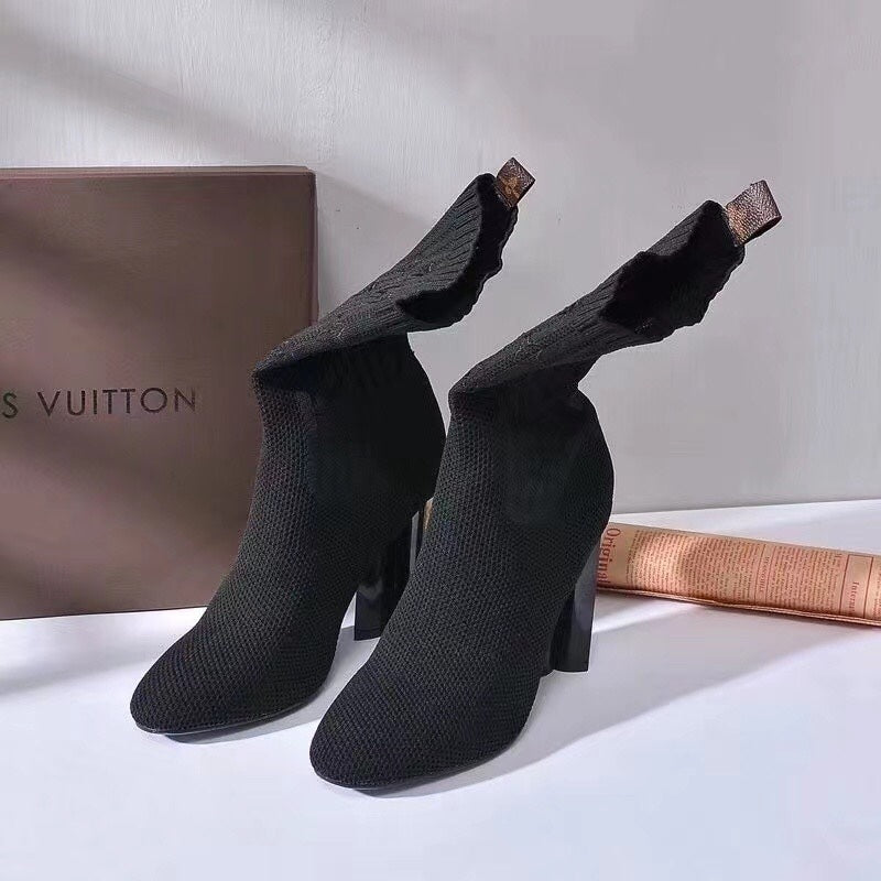 Bota Cano Médio Silhueta Clássica