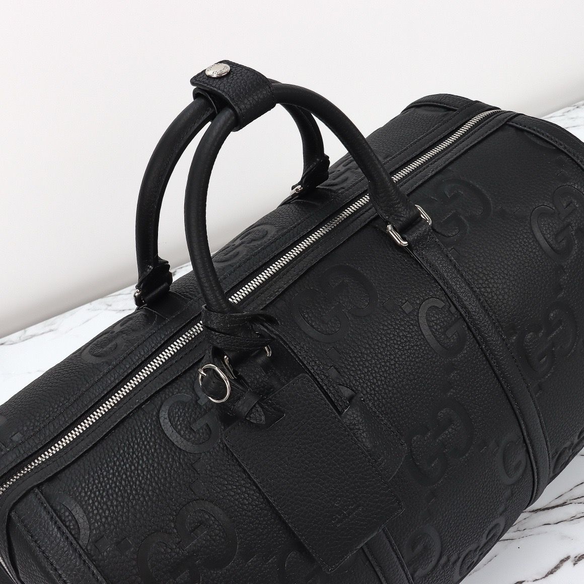 Bolsa Duffle Couro Padrão Letras Entrelaçadas Marrom Grande