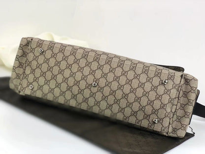 Bolsa Satchel Lona Padrão Letras Entrelaçadas Marrom Médio