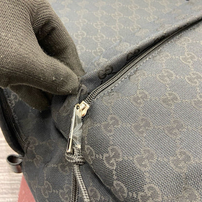 Mochila Média Couro Padrão Letras Entrelaçadas Marrom