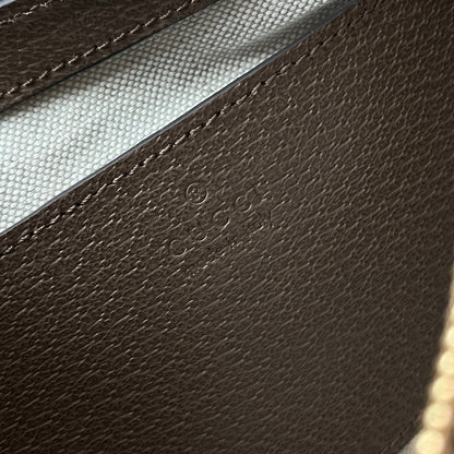Bolsa Pequena Couro Bege e Preto Alça Corrente