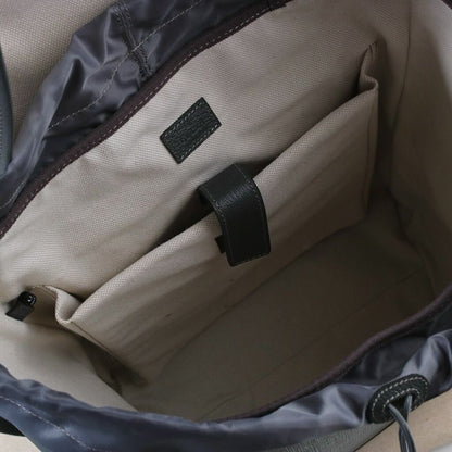 Mochila Couro Letras Entrelaçadas