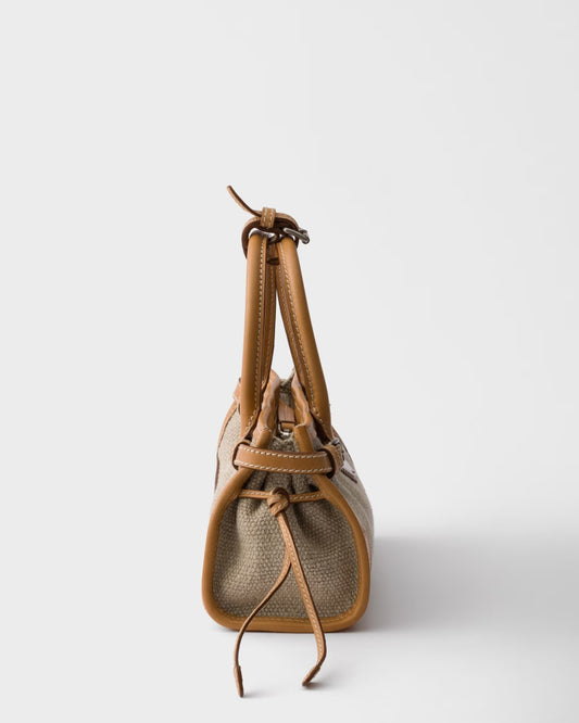 Bolsa Prada Bonnie pequena em linho e couro vista lateral